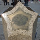 (увеличить фото) Одна из мраморных звёзд с фамилиями Советских (Российских) космонавтов на Аллее космонавтов недалеко от станции метро "ВДНХ" в Москве (12 апреля 2009 года)